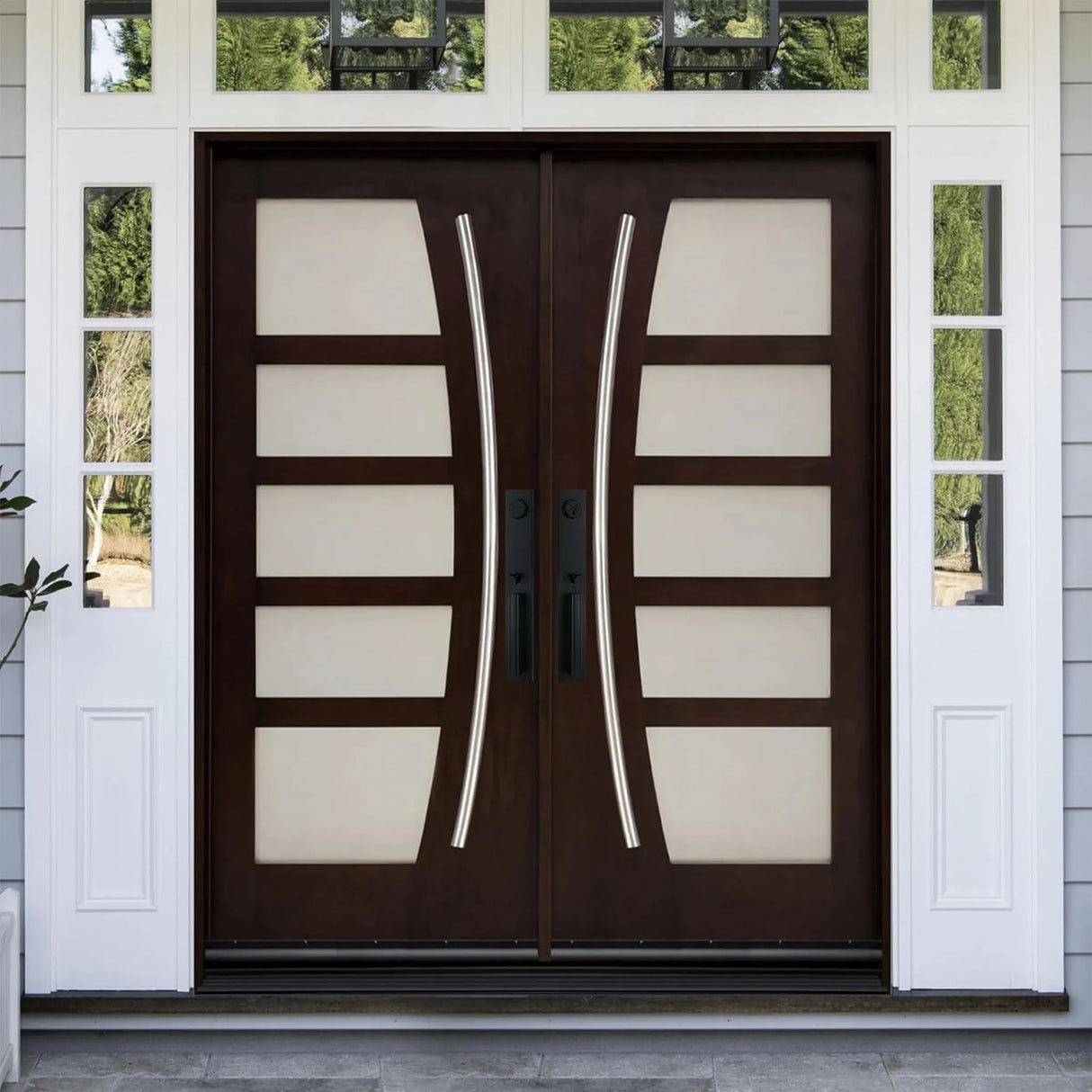 Double front entry door installed on home exterior with decorative glass panels and traditional styling