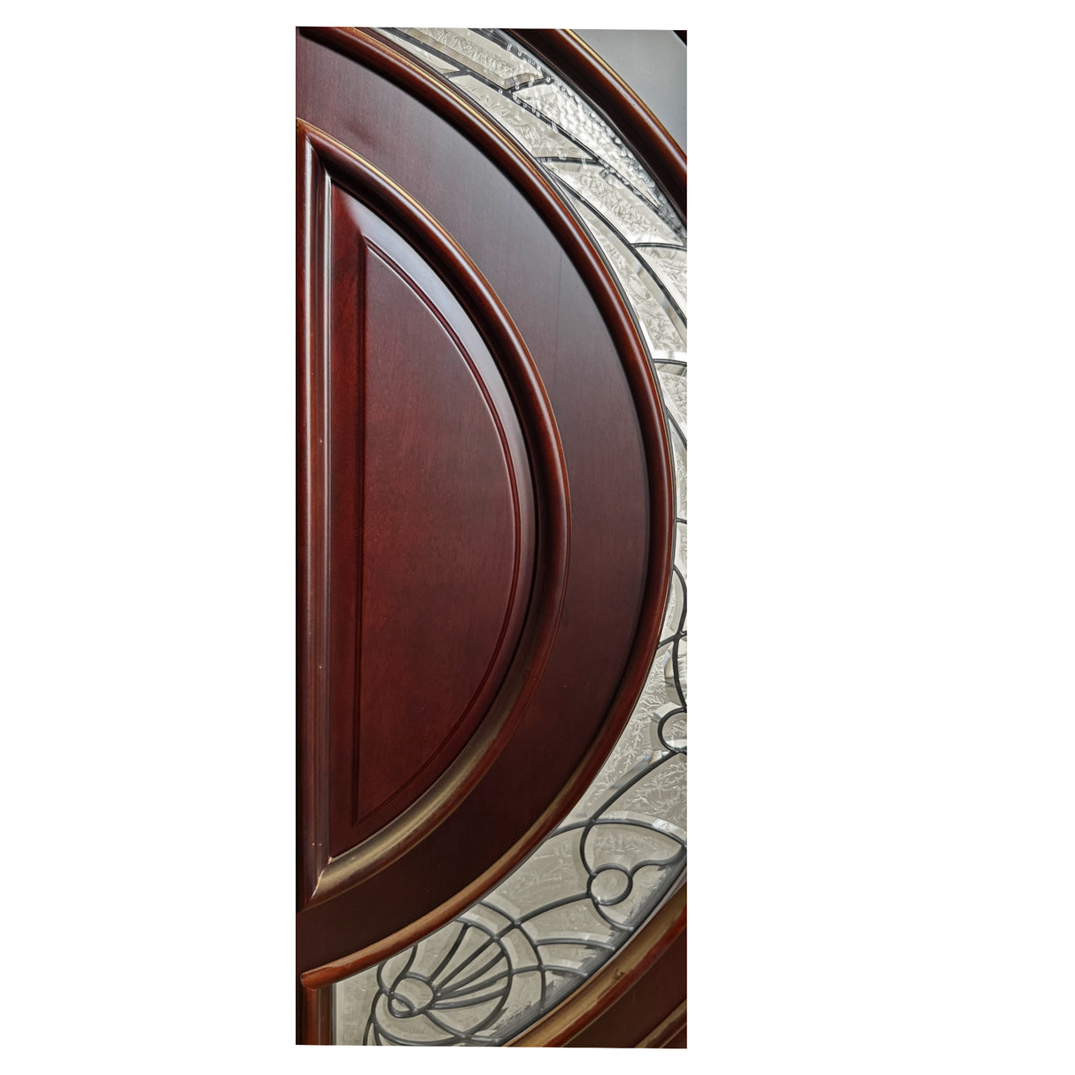 Close-up of crescent-shaped glass inserts on entry door showing curved decorative design