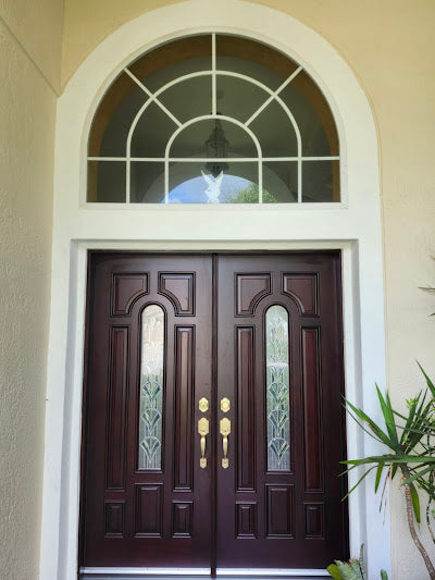 Solid wood front door with rich stain and natural grain