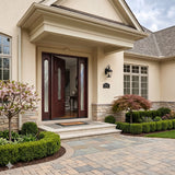 Fiberglass double front entry door open installed on home exterior with decorative arched beveled glass panels