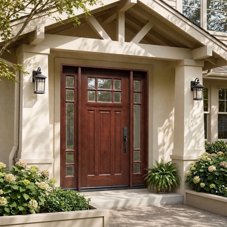 Front entry door with sidelights installed on home exterior with decorative glass panels and classic traditional styling
