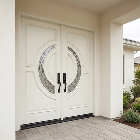 White double front entry door installed on home exterior with crescent glass panels and traditional styling