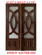 A pair of exterior wooden double doors with decorative glass panels