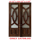 A pair of exterior wooden double doors with decorative glass panels