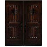 Double front entry door with decorative glass panels and castle-style design, straight-on exterior view