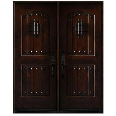 Double front entry door with decorative glass panels and castle-style design, straight-on exterior view