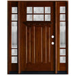 Front entry door with two sidelights and decorative glass panels, classic traditional design, straight-on exterior view