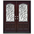 Double front entry door with decorative glass panels and classic panel design, straight-on exterior view