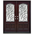 Double front entry door with decorative glass panels and classic panel design, straight-on exterior view