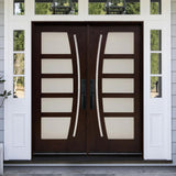 Double front entry door installed on home exterior with decorative glass panels and traditional styling