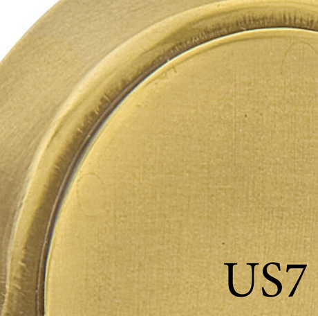 Close-up of ribbon and reed door handle finish in french antique showing aged metal texture